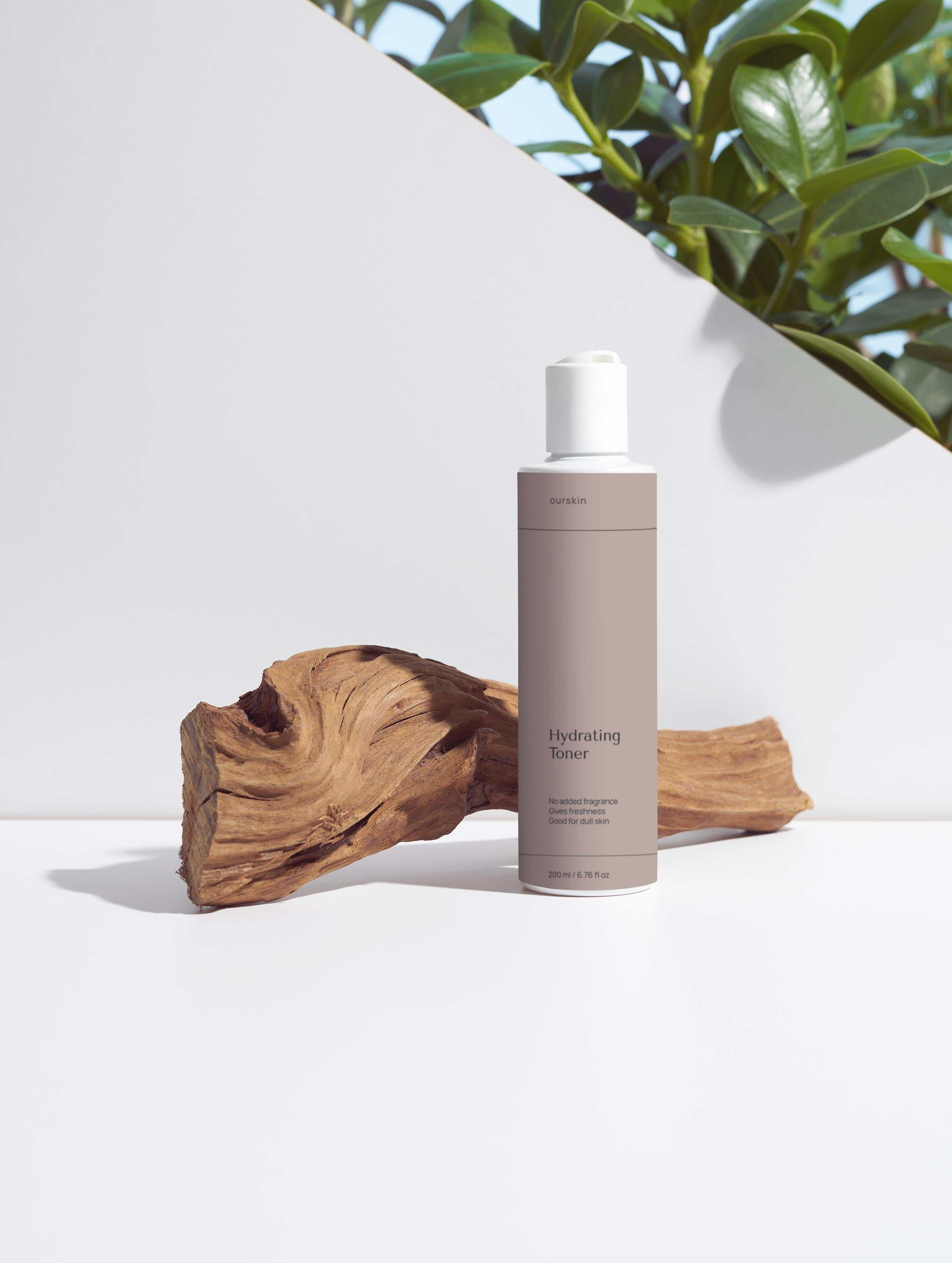 Hydrating toner bottle with rose water and hyaluronic acid for dry, mature skin hydration